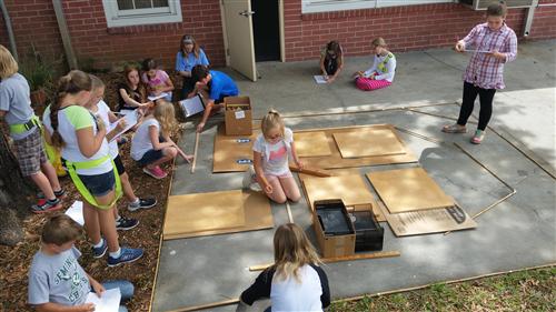 5th Grade STEM Academy students measuring the maze to conquer the Sphero 2.0 Challenge. 5th Grade STEM Academy students measuring the maze to conquer the Sphero 2.0 Challenge.